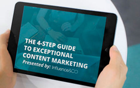 The 4-Step Guide to Executing Exceptional Content Marketing. Image contents: Two hands holding an iPad with the whitepaper on the screen.
