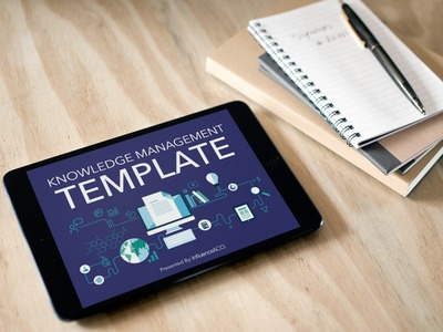 Knowledge Management Template. Image contents: Photo of a book, a notebook, a pen, and an iPad with the template on the screen.